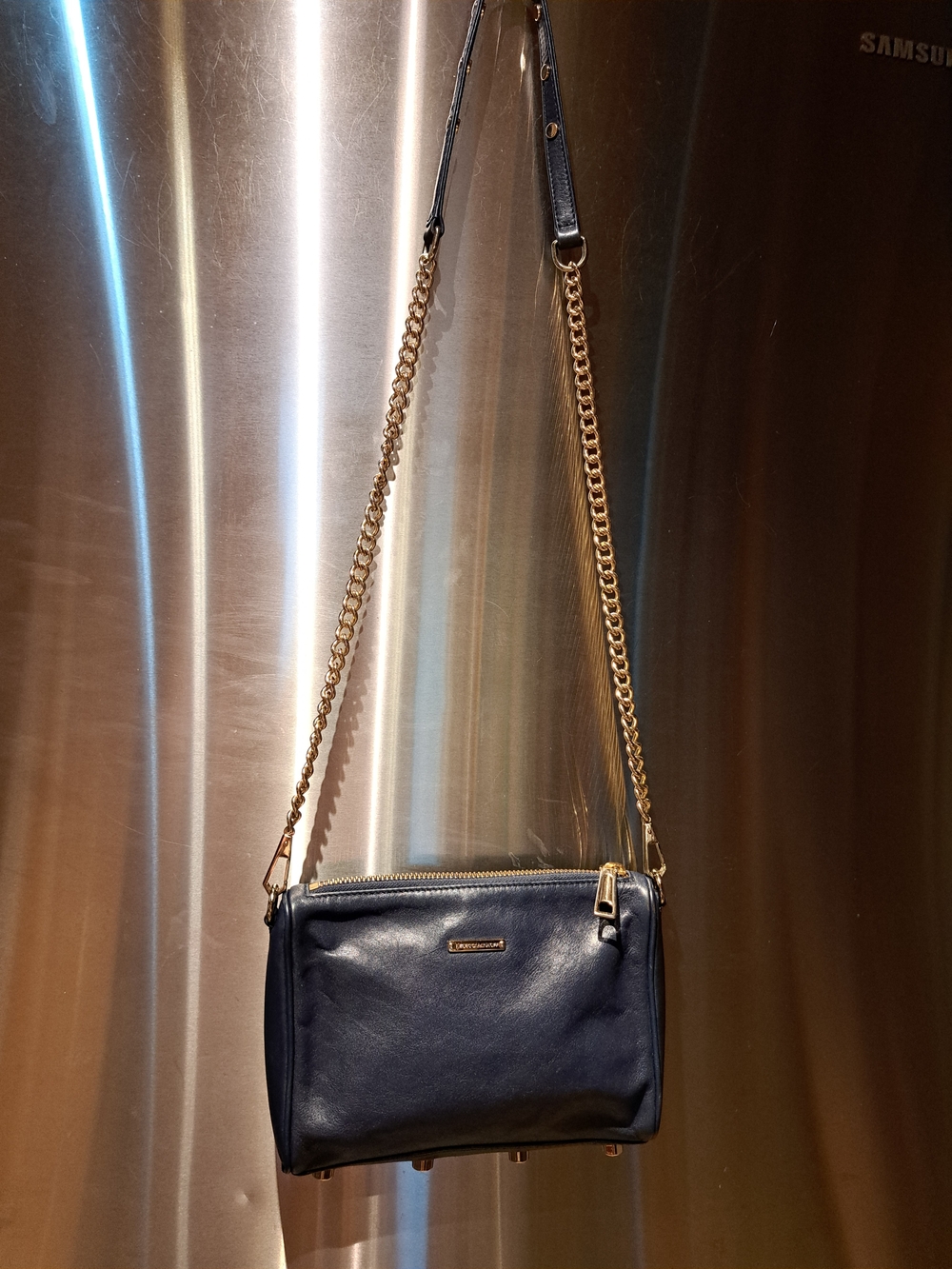 Rebecca Minkoff navy leather crossbody with gold chain strap